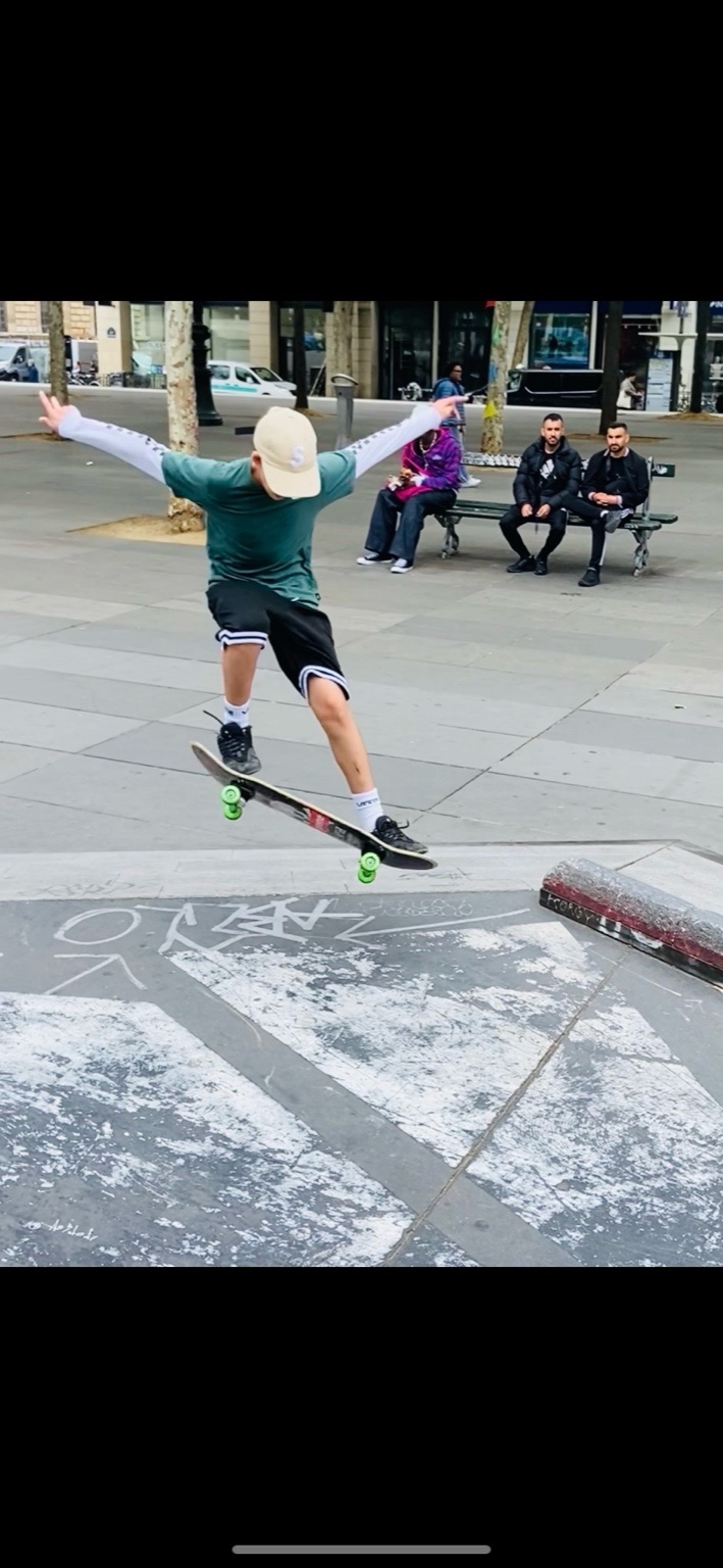 Azi skating at a street spot